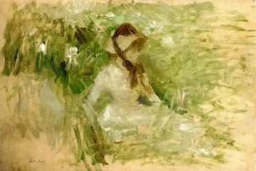 Young Woman Sitting On The Grass